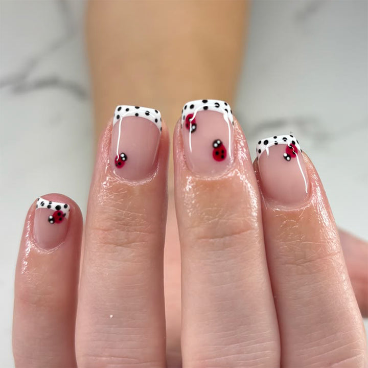 Artistic nail art with ladybug designs Bowlift