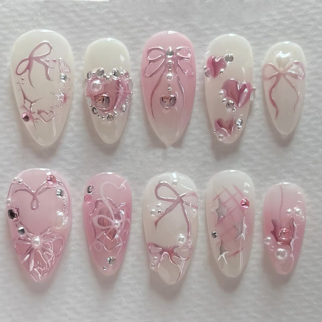 Artificial nail art with delicate jewelry design Bowlift