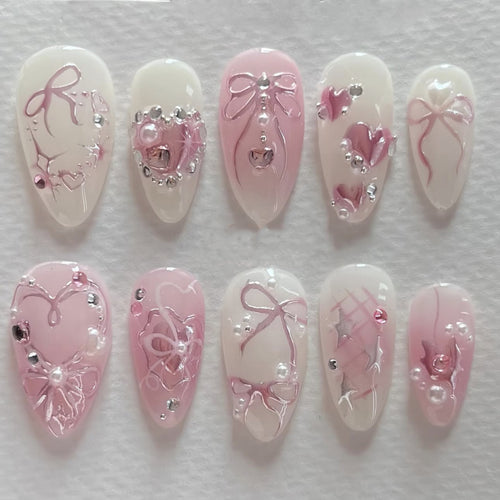 Artificial nail art with delicate jewelry design Bowlift