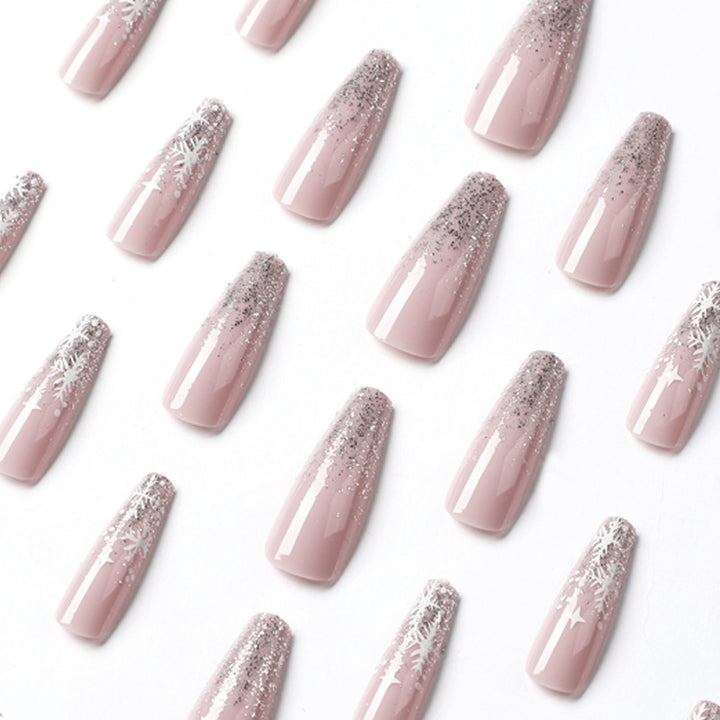 Artful nail art in winter design with glitter and snowflakes Bowlift