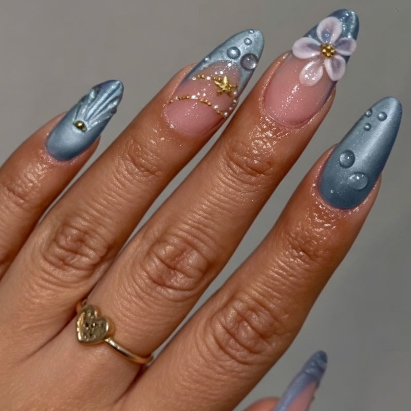 Creative acrylic nail set with elegant flower and glitter accents Bowlift