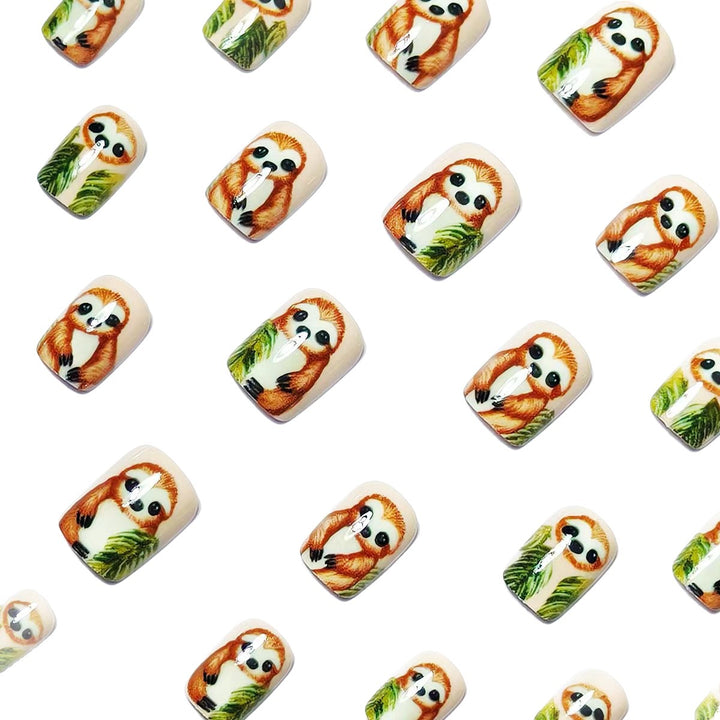 Art nails with cute sloth and leaf design Bowlift