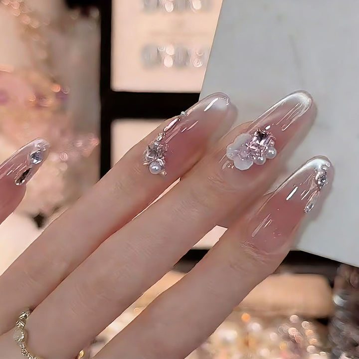 Artificial nail set with sparkling glitter accents Bowlift