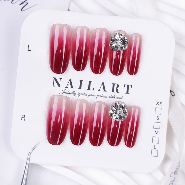 Artificial nails with elegant ombre effect and rhinestone decoration Bowlift