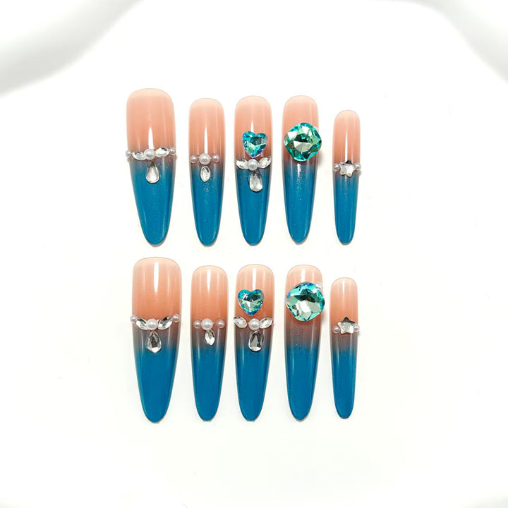 Artificial nails with glitter and rhinestone embellishments Bowlift