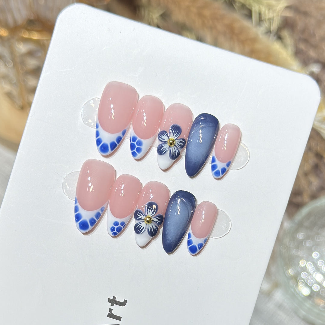Artistic Press-On Nail Set with Floral and Geometric Accents Bowlift