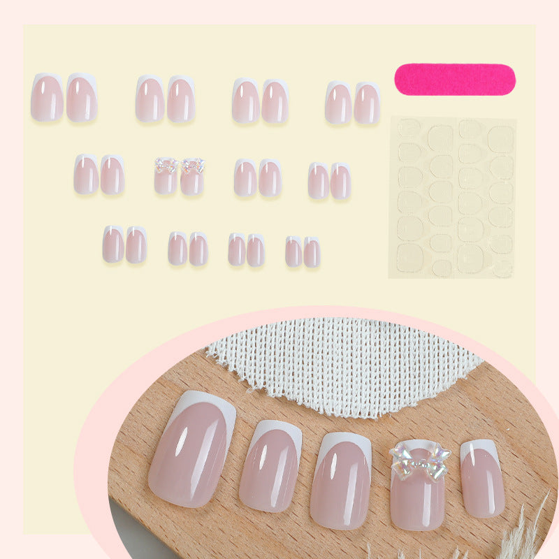 Elegant Glossy Press-On Nails with Jewel Accents Bowlift