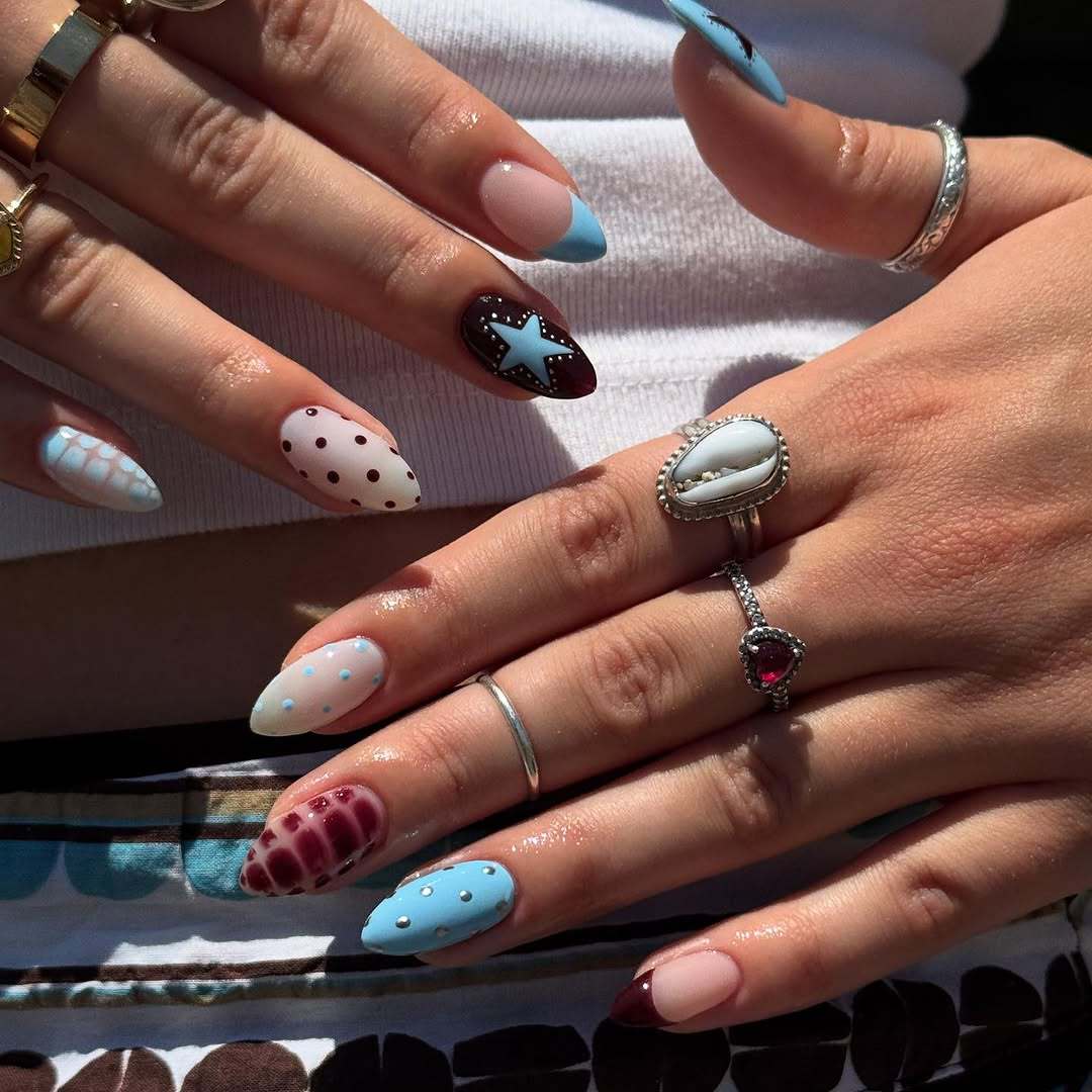 Artificial nail set with creative patterns and playful accents Bowlift