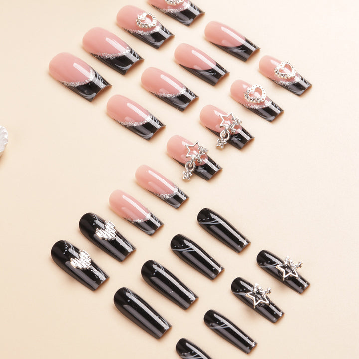 Artistic Long Press-On Nail Design with Rhinestone Accents Bowlift