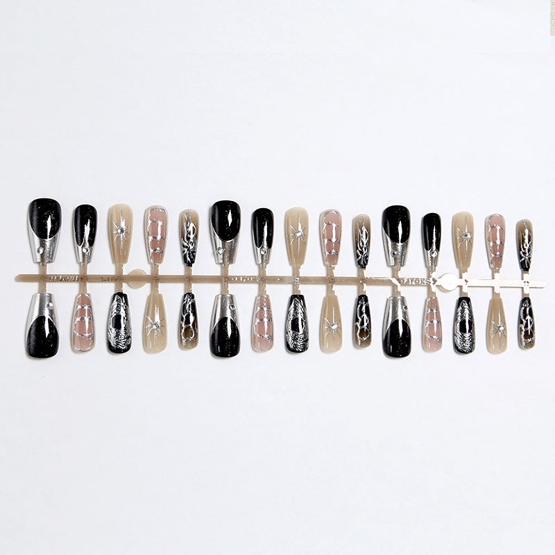 Artificial nail set with elegant glitter and design accents Bowlift
