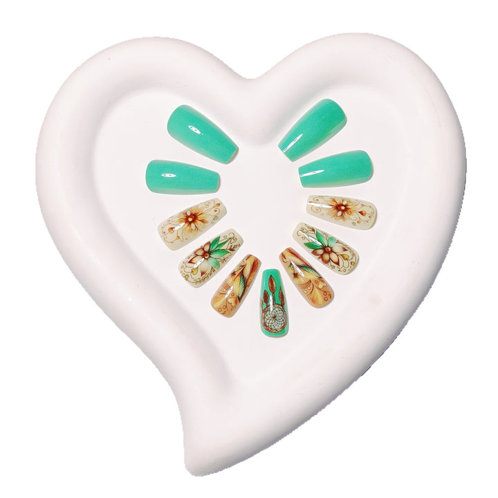 Creative artificial nails with floral and dreamcatcher design elements Bowlift
