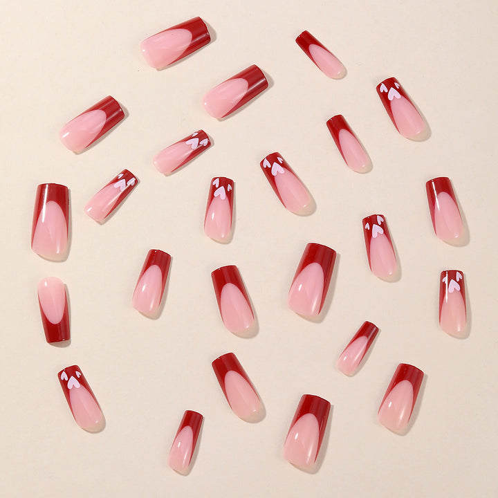 Heart-Patterned Acrylic Nail Art Extensions Bowlift