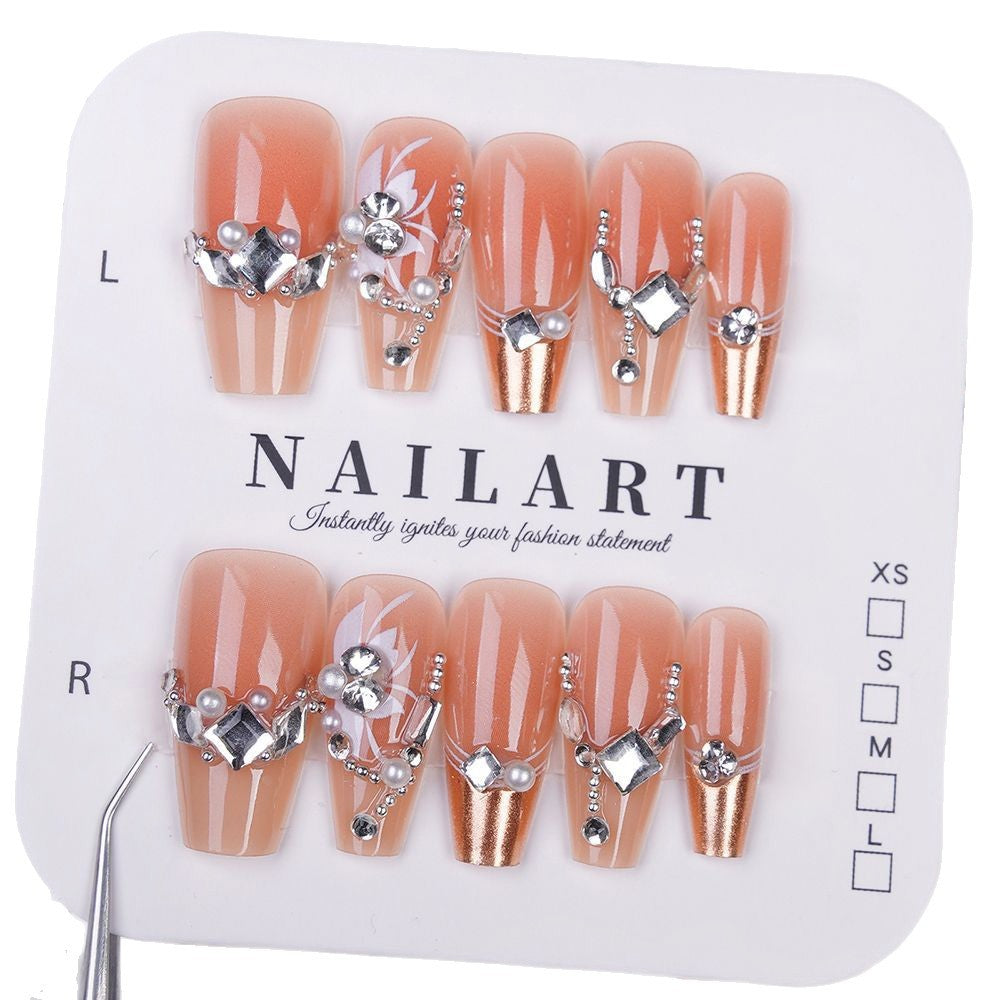 Elegant Press-On Nail Art with Floral and Gemstone Details Bowlift