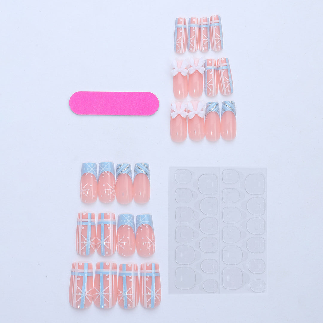 Artificial nail set with winter snowflake and bow motifs Bowlift