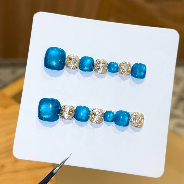 Art Nail Design with Shimmering Accents and Sparkling Rhinestone Details Bowlift