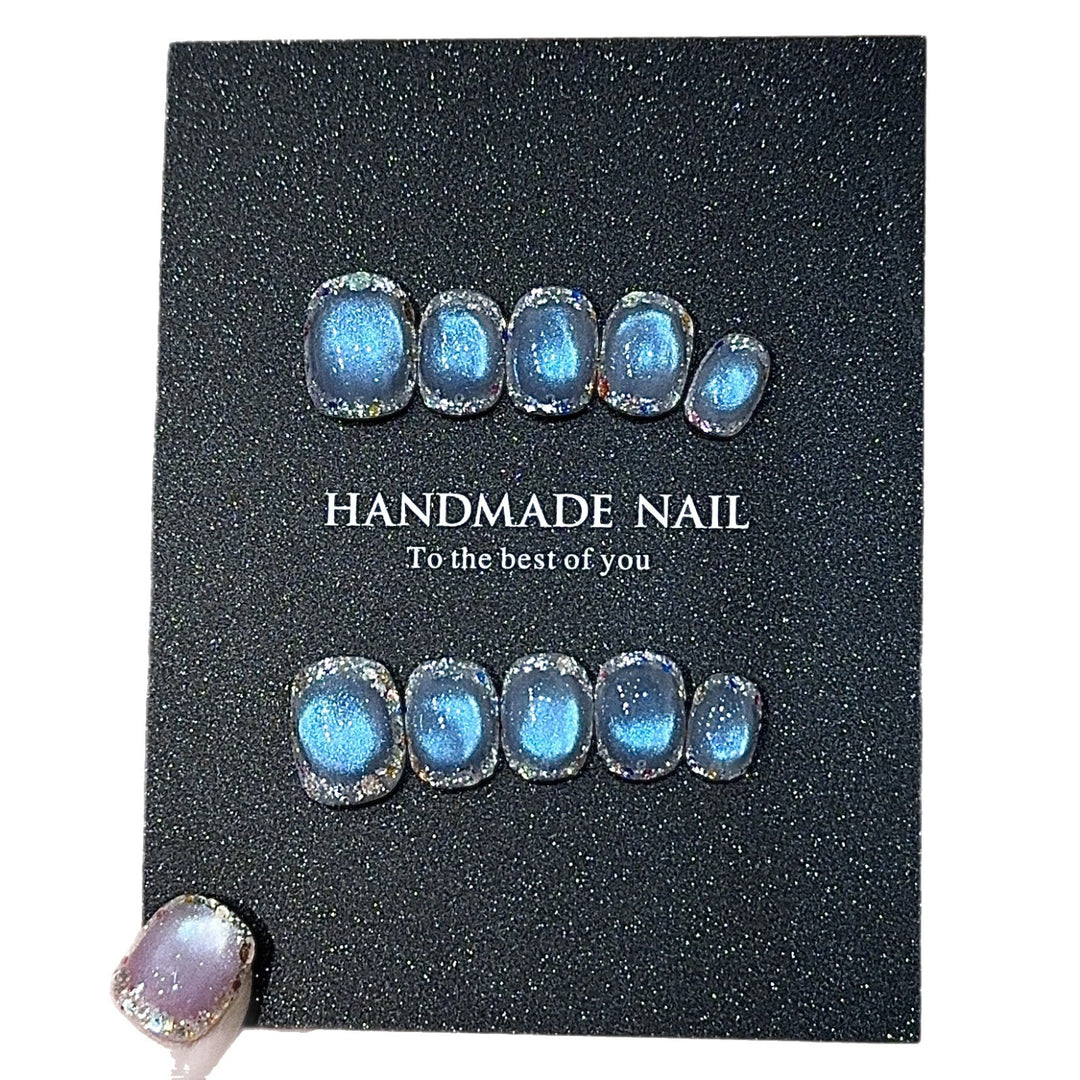 Handmade art nails with shimmering effects Bowlift
