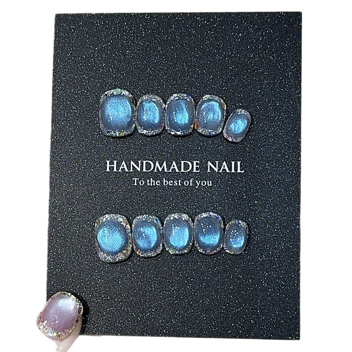 Handmade art nails with shimmering effects Bowlift