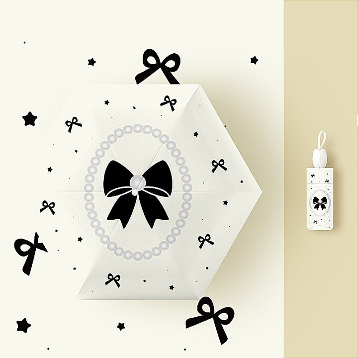 Ladies' kid-friendly folding umbrella with fun rabbit design Bowlift