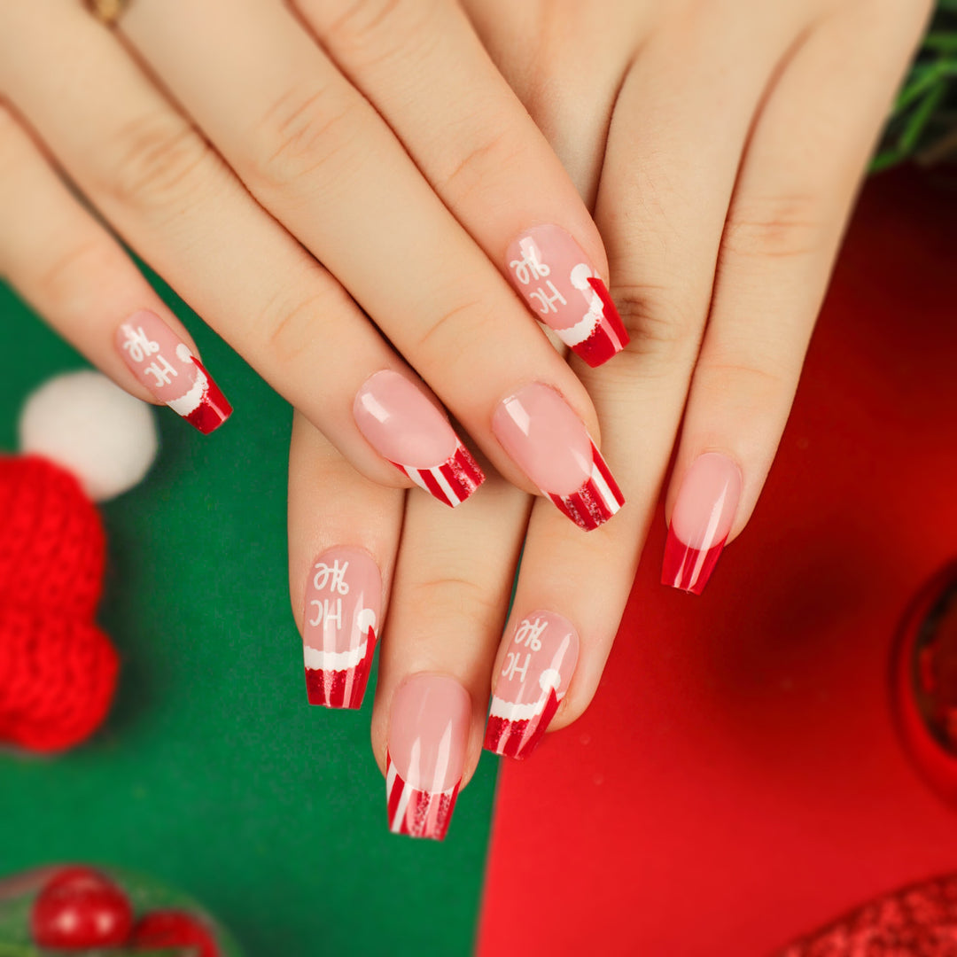 Artificial nail extensions in festive Christmas design Bowlift