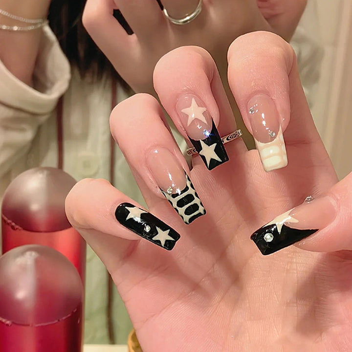 Artistic Nail Extensions with Star and Animal Design Bowlift