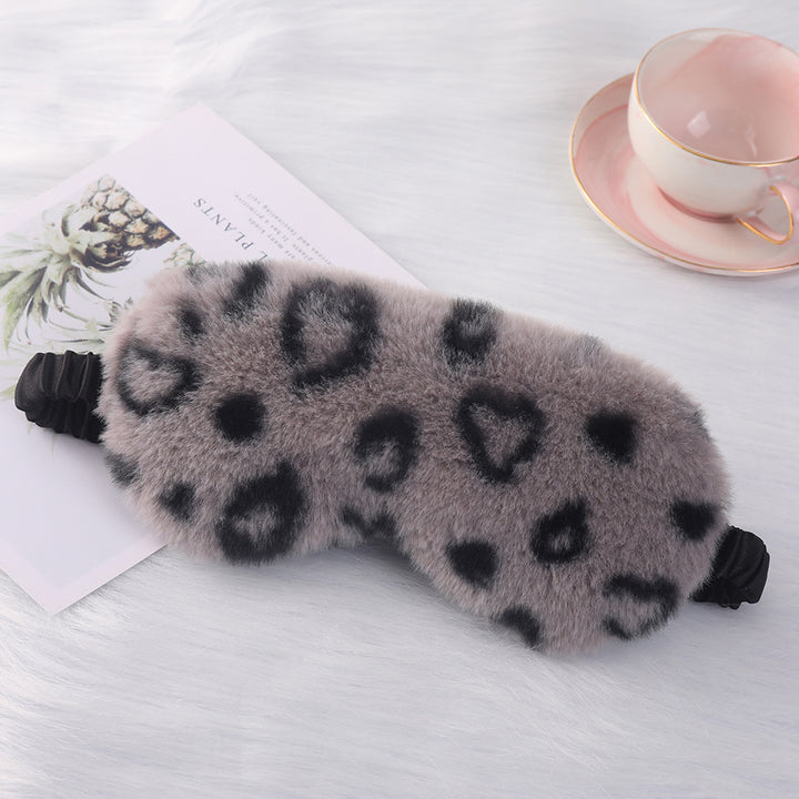 Women's cuddly faux fur sleep mask with heart-embossed surface and gathered comfort band Bowlift