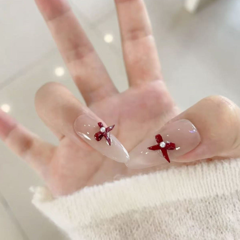 Elegant Stiletto Press-On Nails with Decorative Accents Bowlift
