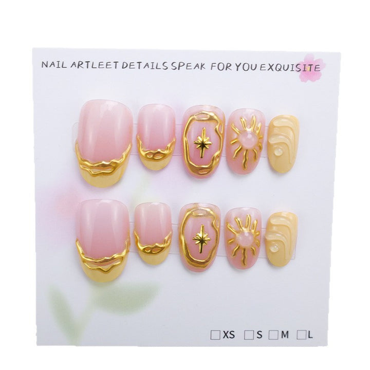Acrylic nail set with elegant gold embellishments and creative designs Bowlift
