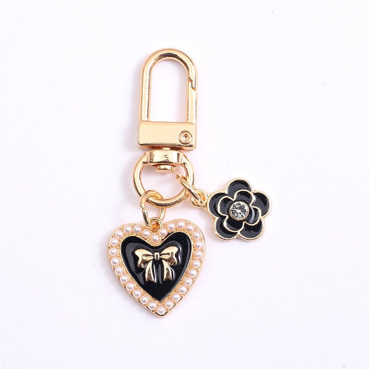 Playful keychain with teddy bear motif Bowlift