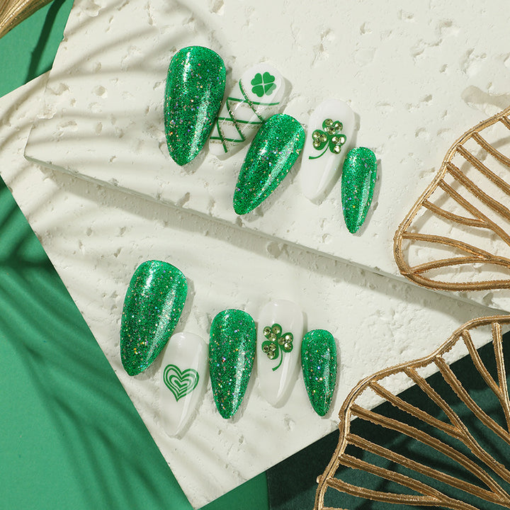 Artistic Stiletto Nails with Glitter and Clover Leaf Designs Bowlift