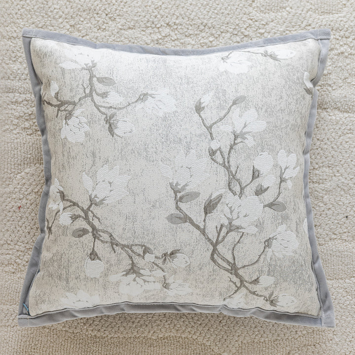 Decorative cushion with floral motifs