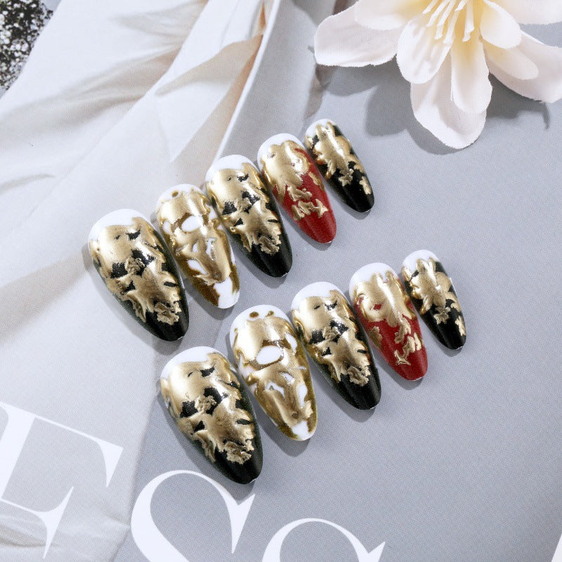 Elegant artificial nails with gold and black pattern Bowlift