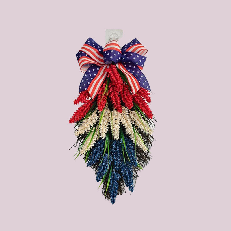 Independence Day tiered faux wildflower door swag with grosgrain stars-and-stripes bow Bowlift