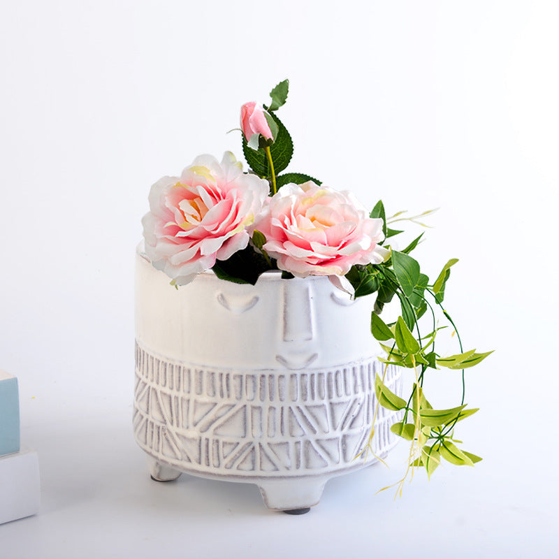 Decorative plant pot with facial features Bowlift