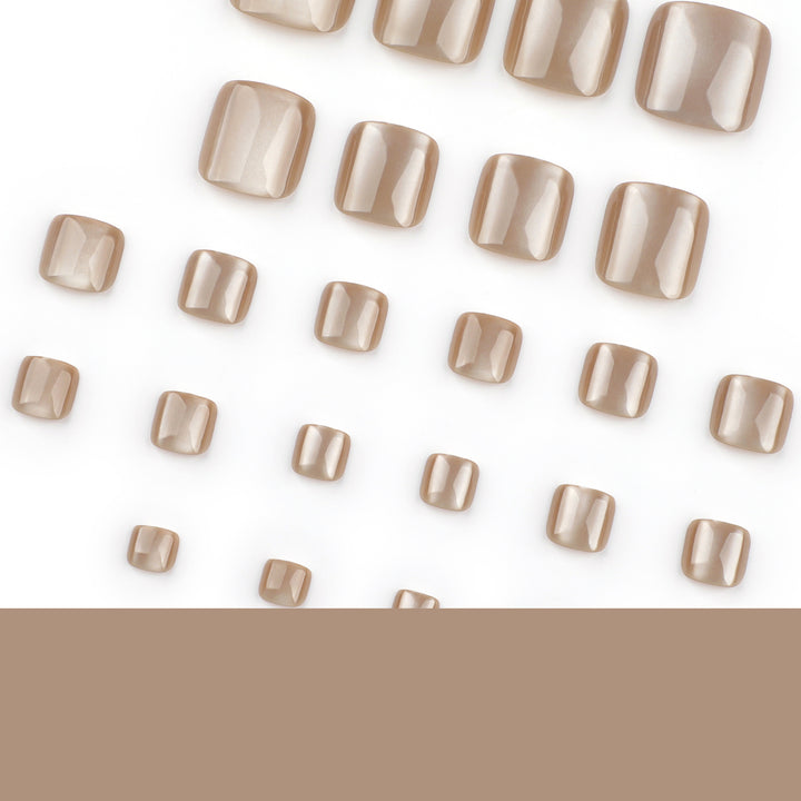 Artful nail art with glitter accents and soft ombre effect Bowlift