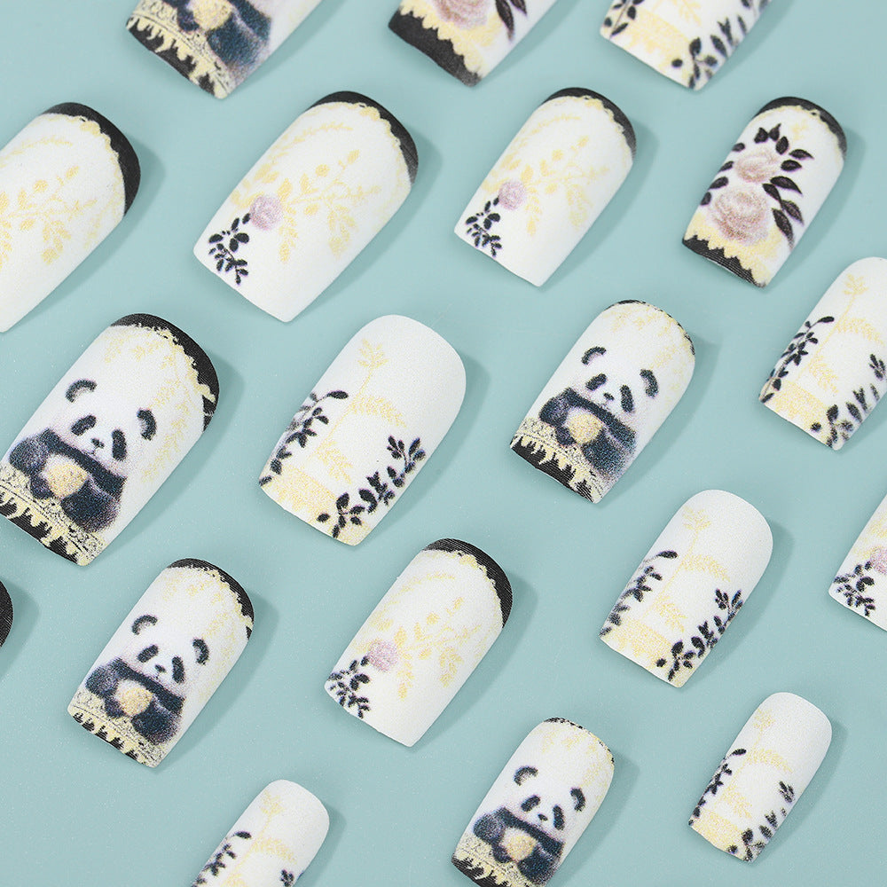 Artificial nails with floral panda design Bowlift