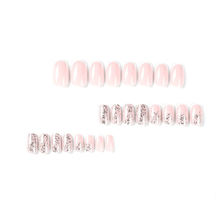 Artistic Nail Extensions with Glitter and French Tips Bowlift