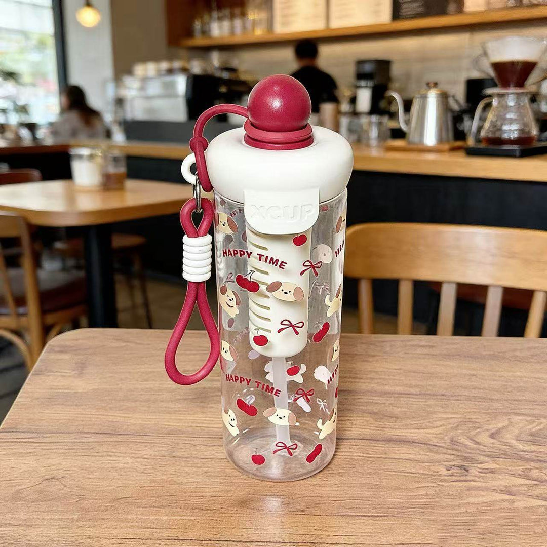 Women's water bottle with cheerful design and practical carrying handle Bowlift