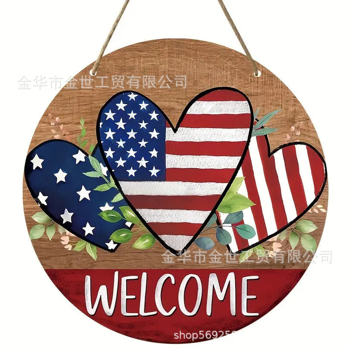 Independence Day rustic round wooden patriotic cross wall plaque with floral accents and God Bless America banner Bowlift