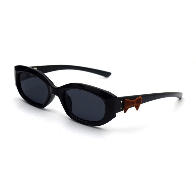 Trendy Cat-Eye Sunglasses with Adorable Teddy Bear Accent Bowlift