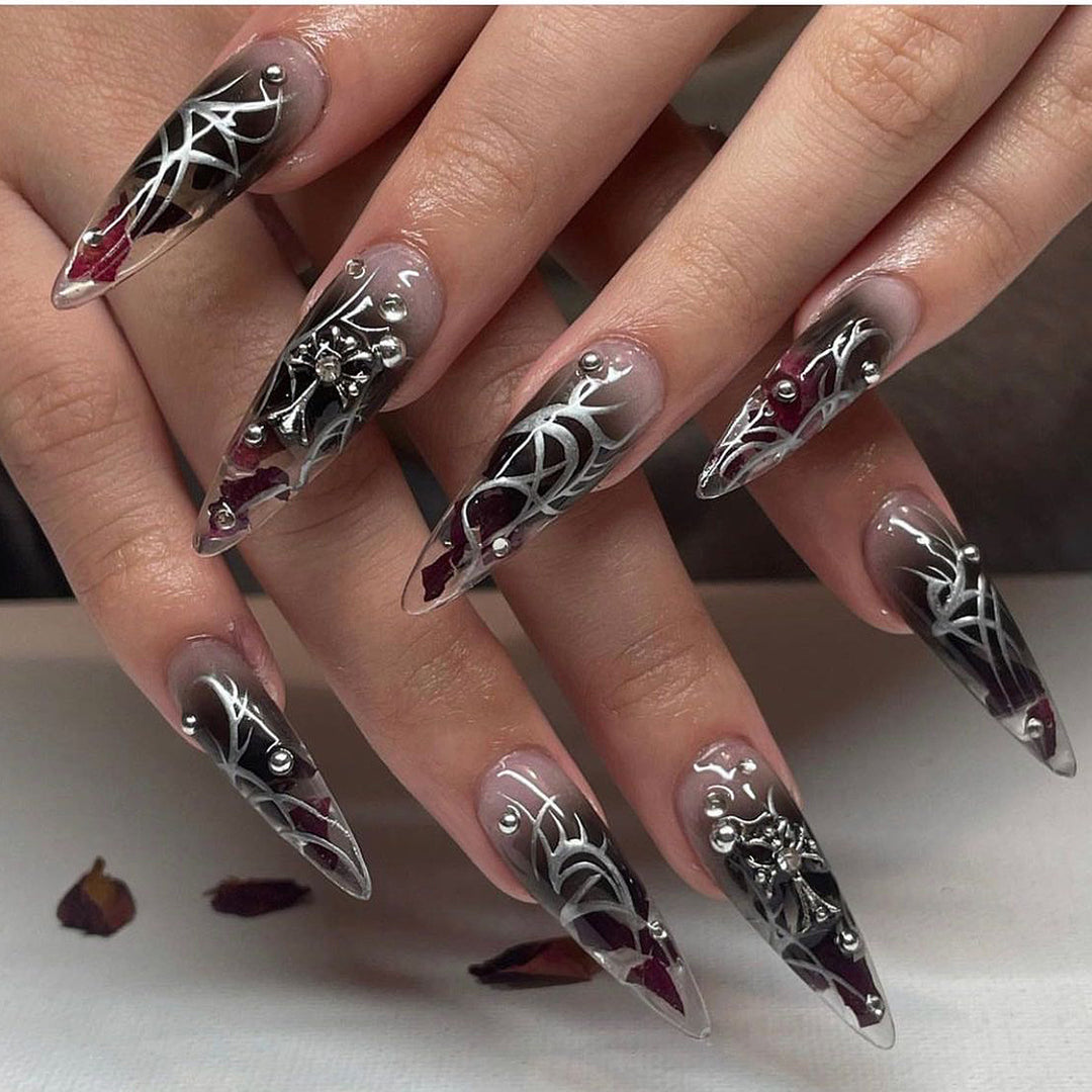 Artful stiletto nails with elegant decoration and modern accents Bowlift