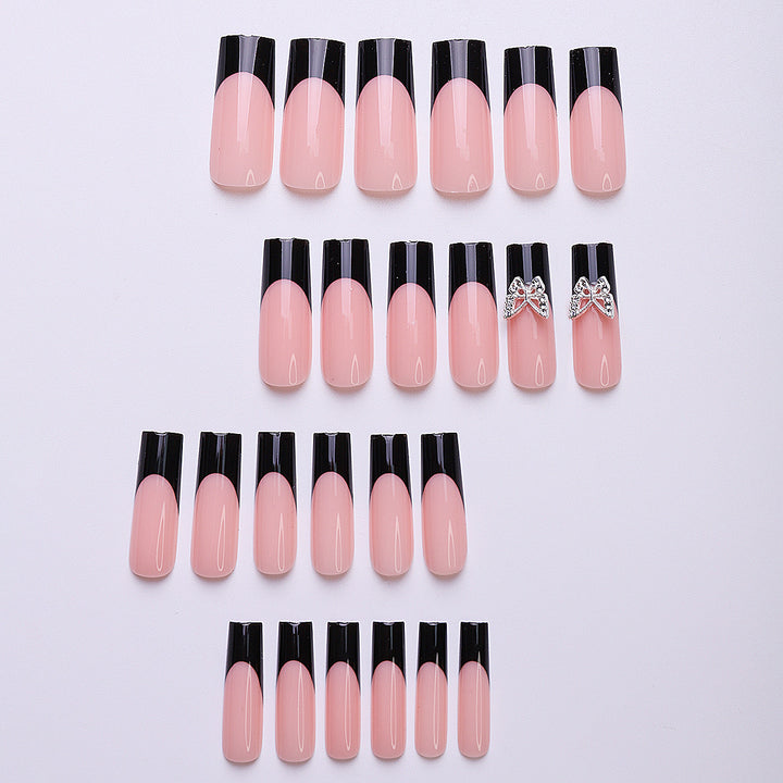 Acrylic nail set with elegant butterfly accents Bowlift