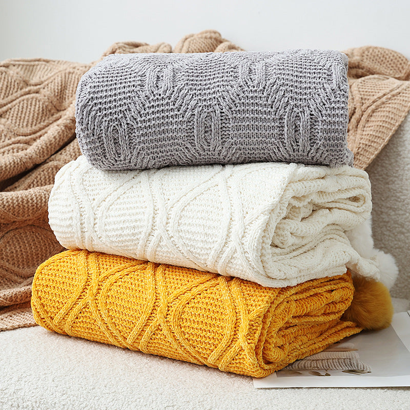 Ladies knit blanket with decorative pom poms Bowlift