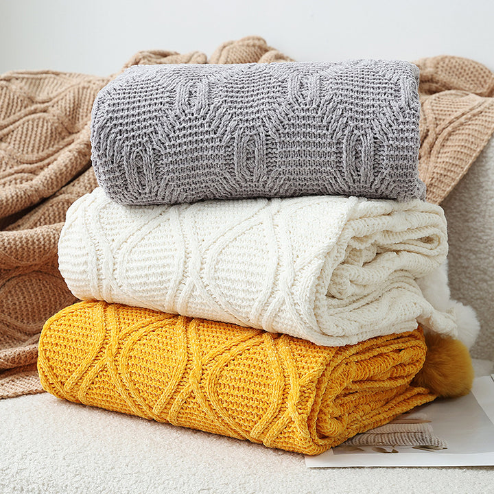 Ladies knit blanket with decorative pom poms Bowlift