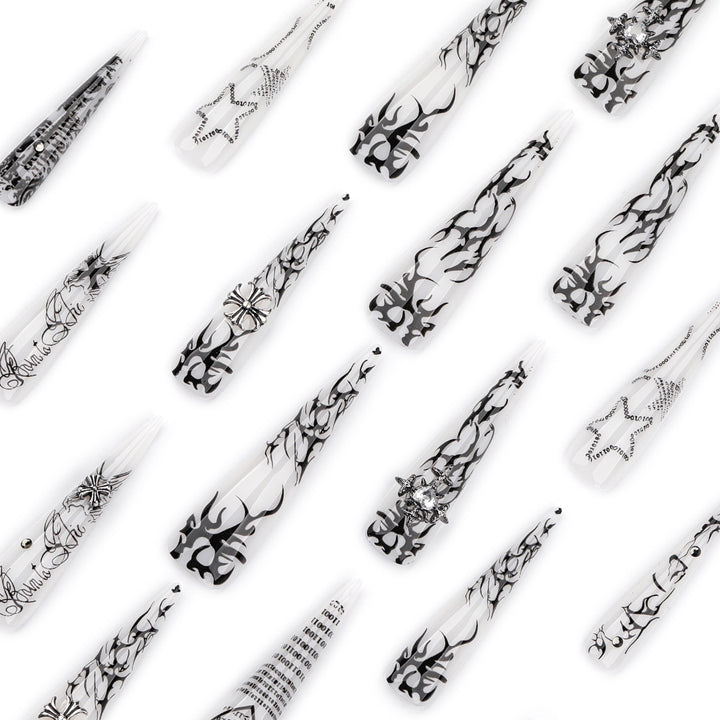 Artful stiletto nails with gothic pattern and embellishments Bowlift