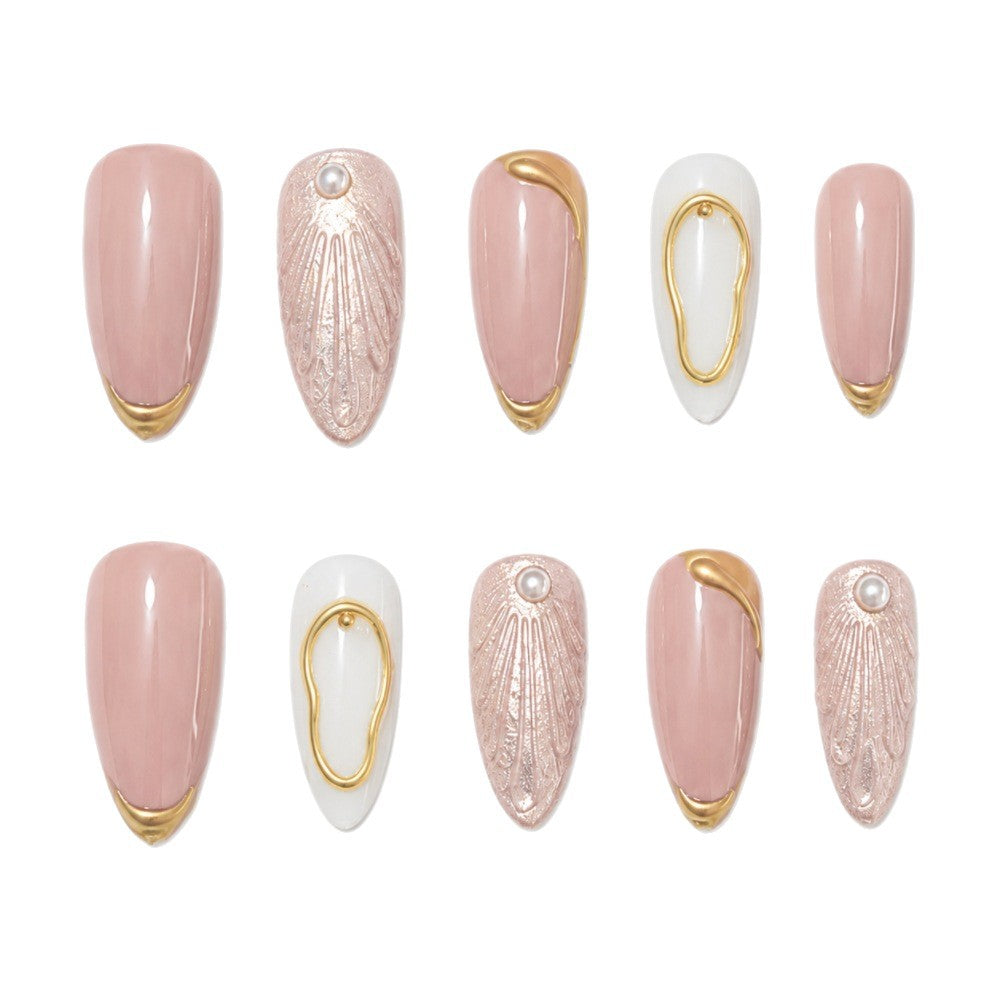 Artistic Press-On Nail Design with Gold Embellishments Bowlift