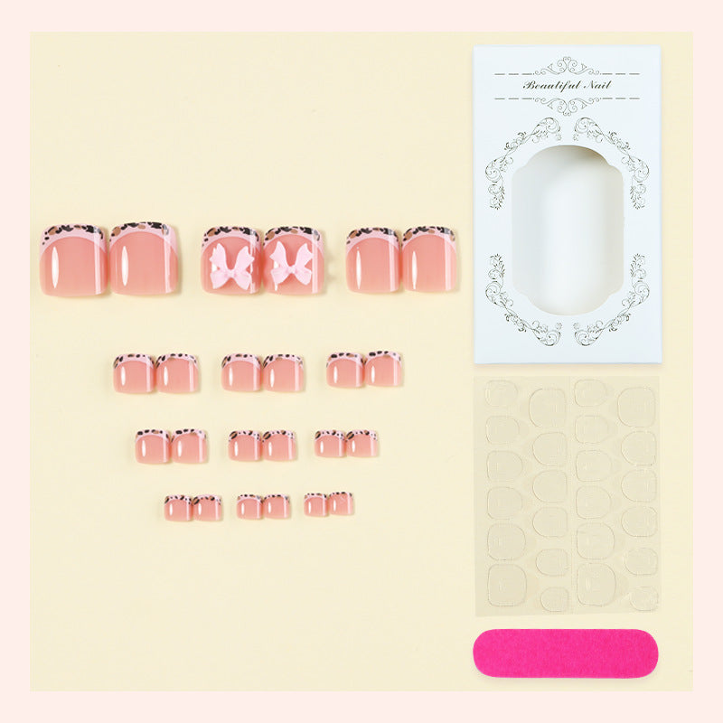 Acrylic nail set with elegant bows and luxurious designs Bowlift