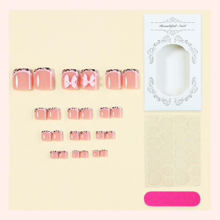 Acrylic nail set with elegant bows and luxurious designs Bowlift