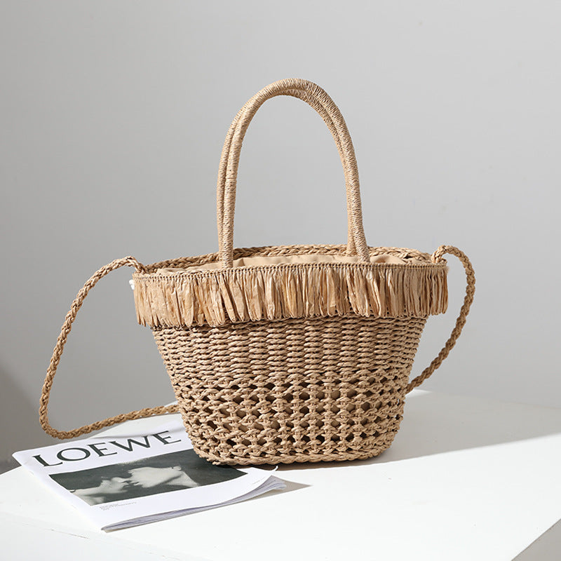 Braided straw bag with decorative tassel detail Bowlift