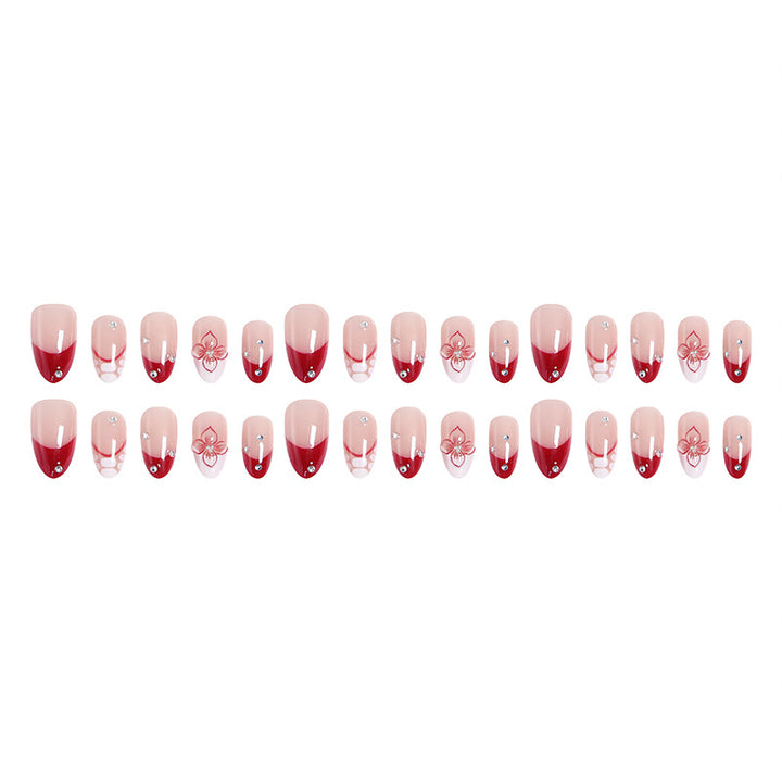 Artificial nails with floral and glittering accents Bowlift