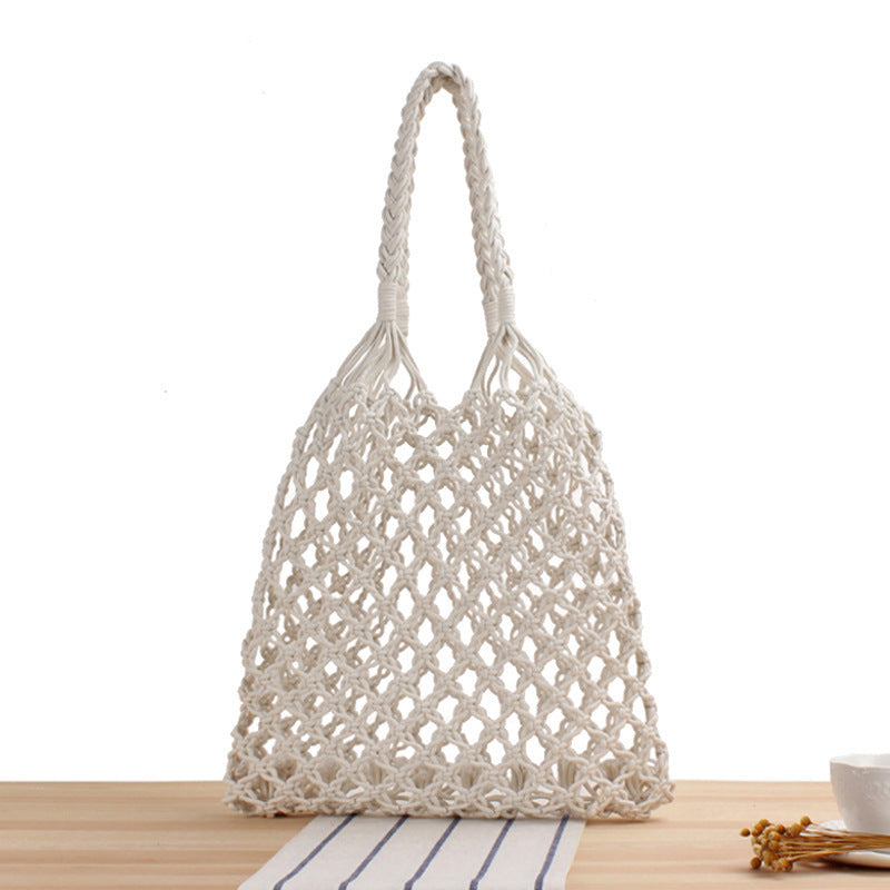 Mesh tote bag made of handcrafted natural material with unique pattern Bowlift